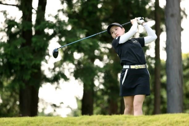 Yuna Nishimura of Japan hits her tee shot on the 15th hole during the final round of the Stanley Ladies at Tomei Country Club on October 10, 2021 in...