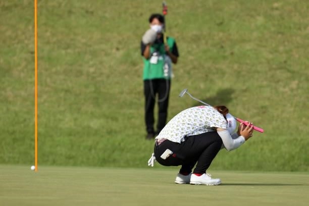 Mao Saigo of Japan shows dejection after missing the birdie putt on the 18th green during the final round of the Stanley Ladies at Tomei Country Club...