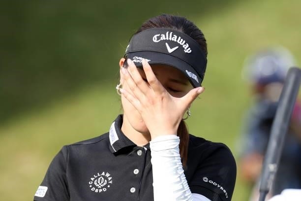 Yuna Nishimura of Japan shows dejection after missing the birdie putt on the 18th green during the final round of the Stanley Ladies at Tomei Country...