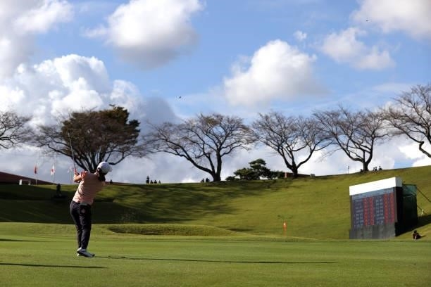 Amateur Miyu Sato of Japan hits her third shot on the 18th hole during the final round of the Stanley Ladies at Tomei Country Club on October 10,...