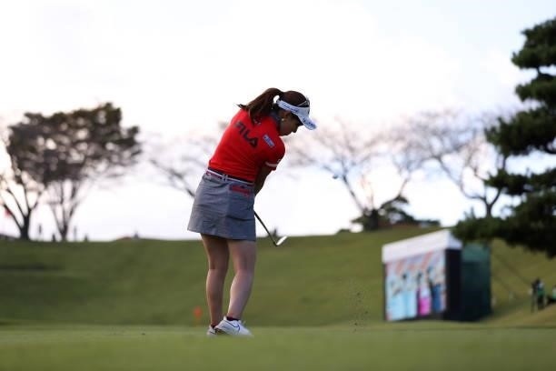 Ayako Kimura of Japan hits her third shot on the playoff first hole on the 18th hole during the final round of the Stanley Ladies at Tomei Country...
