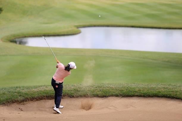 Amateur Miyu Sato of Japan hits her second shot from a bunker on the 8th hole during the final round of the Stanley Ladies at Tomei Country Club on...
