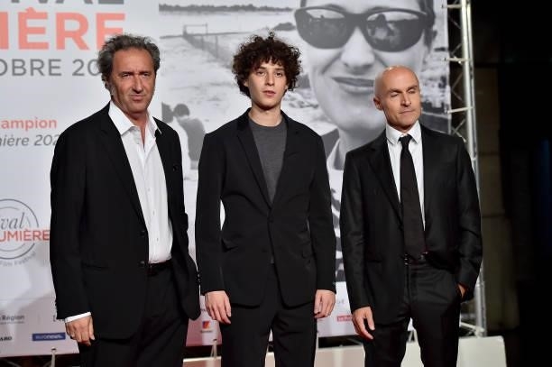 Paolo Sorrentino, Filippo Scotti and Lorenzo Mieli attends the opening ceremony during the 13th Film Festival Lumiere In Lyon on October 09, 2021 in...