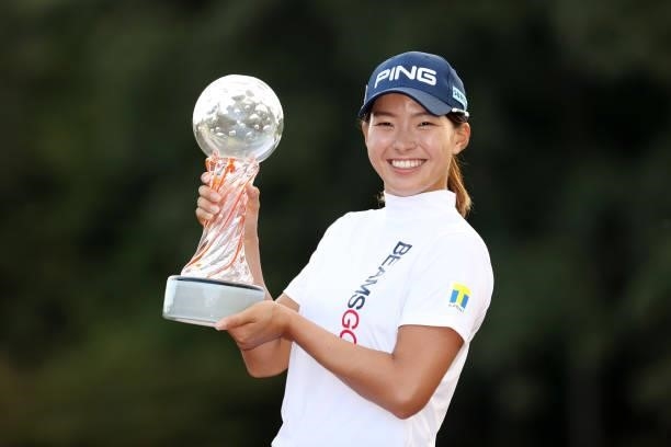 Hinako Shibuno of Japan poses with the trophy after winning the tournament following the final round of the Stanley Ladies at Tomei Country Club on...
