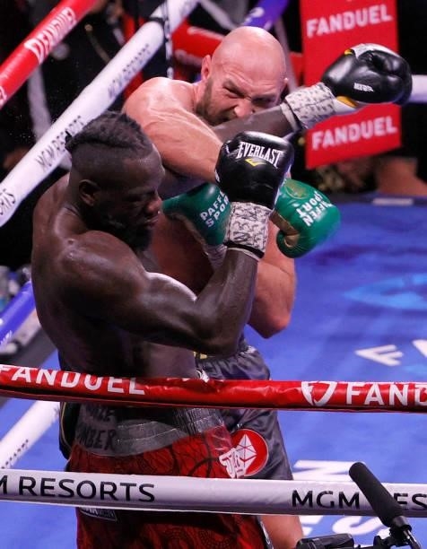 Tyson Fury knocks out Deontay Wilder in the 11th round of their WBC heavyweight title fight at T-Mobile Arena on October 9, 2021 in Las Vegas, Nevada.