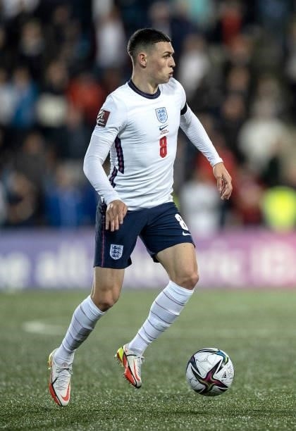 Phil Foden of England runs with the ball during the 2022 FIFA World Cup Qualifier match between Andorra and England at Estadi Nacional on October 09,...