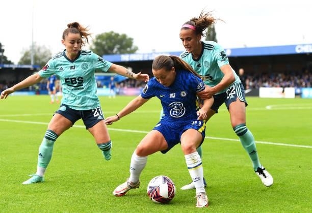 Fran Kirby of Chelsea is challenged by Hannah Cain and Ashleigh Plumptre of Leicester City during the Barclays FA Women's Super League match between...