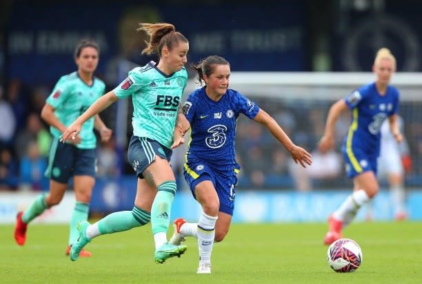 Jessie Fleming of Chelsea and Hannah Cain of Leicester City battle for the ball during the Barclays FA Women's Super League match between Chelsea...
