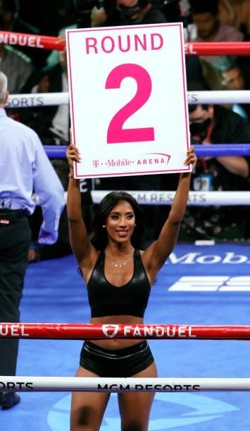 Ring girl Tianna Tuamoheloa signals the start of round two of the WBC heavyweight title fight between Tyson Fury and Deontay Wilder at T-Mobile Arena...