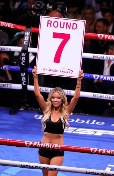 Ring girl Stephanie Ann Cook signals the start of round seven of the WBC heavyweight title fight between Tyson Fury and Deontay Wilder at T-Mobile...