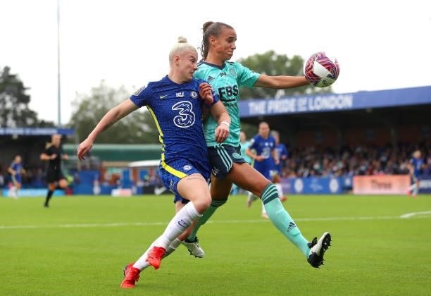Bethany England of Chelsea and Ashleigh Plumptre of Leicester City battle for the ball during the Barclays FA Women's Super League match between...