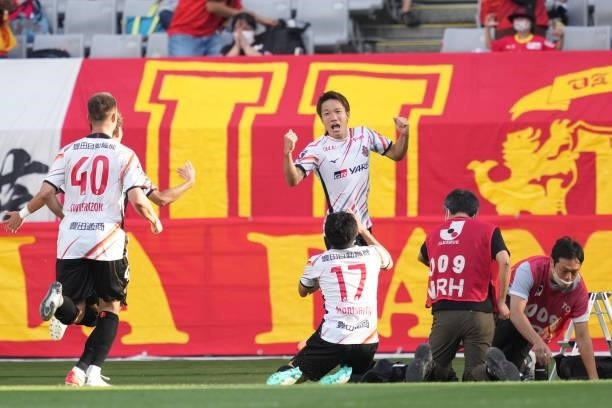 Sho INAGAKI of Nagoya Grampus celebrates scoring his side's first goal with his team mates during the J.League Levain Cup Semi Final second leg match...