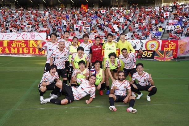 Nagoya Grampus players applaud fans after the J.League Levain Cup Semi Final second leg match between FC Tokyo and Nagoya Grampus at Ajinomoto...