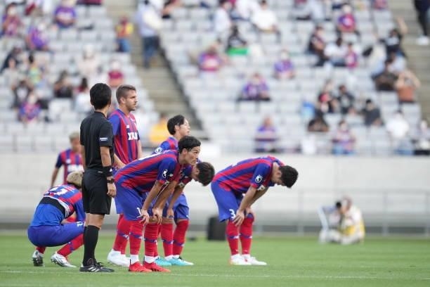 Tokyo players show dejections after the J.League Levain Cup Semi Final second leg match between FC Tokyo and Nagoya Grampus at Ajinomoto Stadium on...