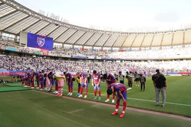 Tokyo players applaud fans after the J.League Levain Cup Semi Final second leg match between FC Tokyo and Nagoya Grampus at Ajinomoto Stadium on...
