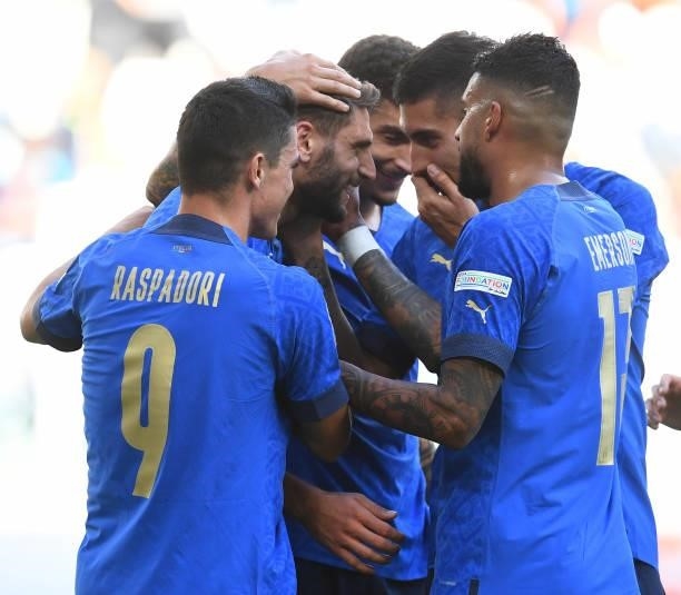 Domenico Berardi of Italy celebrates with team-mates after scoring the second goal during the UEFA Nations League 2021 Third Place Match between...