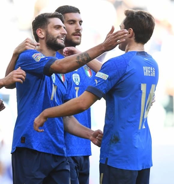Domenico Berardi of Italy celebrates with Federico Chiesa after scoring the second goal during the UEFA Nations League 2021 Third Place Match between...