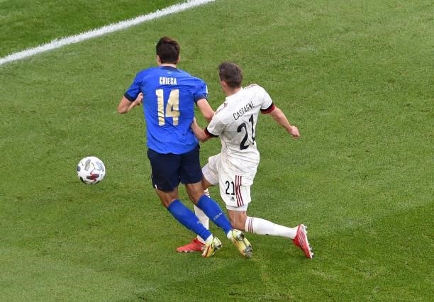 Federico Chiesa of Italy is fouled by Timothy Castagne of Belgium leading to a penalty being awarded during the UEFA Nations League 2021 Third Place...