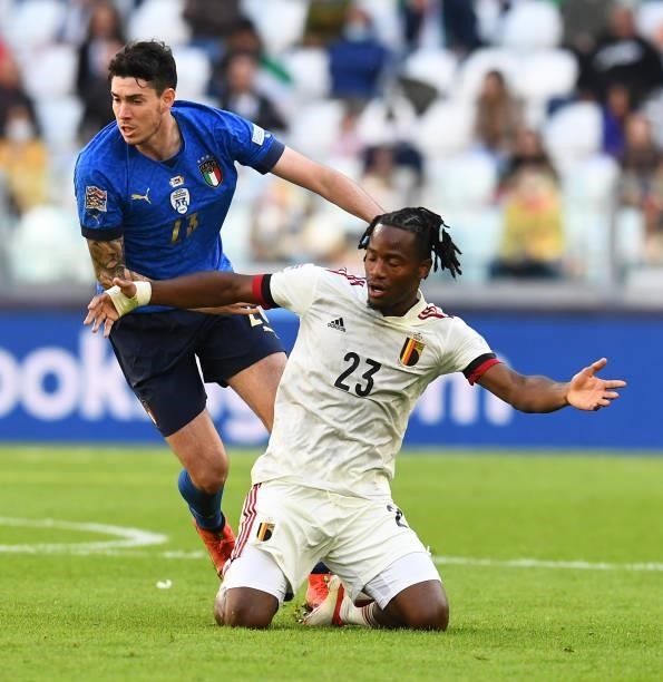 Alessandro Bastoni of Italy competes for the ball with Michy Batshuayi of Belgium during the UEFA Nations League 2021 Third Place Match between Italy...