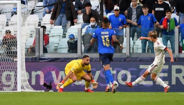 Charles De Ketelaere of Belgium scores their side's first goal past Gianluigi Donnarumma of Italy during the UEFA Nations League 2021 Third Place...