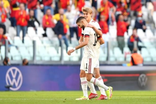 Charles De Ketelaere of Belgium celebrates with teammate Yannick Carrasco after scoring their side's first goal during the UEFA Nations League 2021...