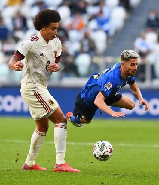 Jorginho of Italy competes for the ball with Axel Witsel of Belgium during the UEFA Nations League 2021 Third Place Match between Italy and Belgium...