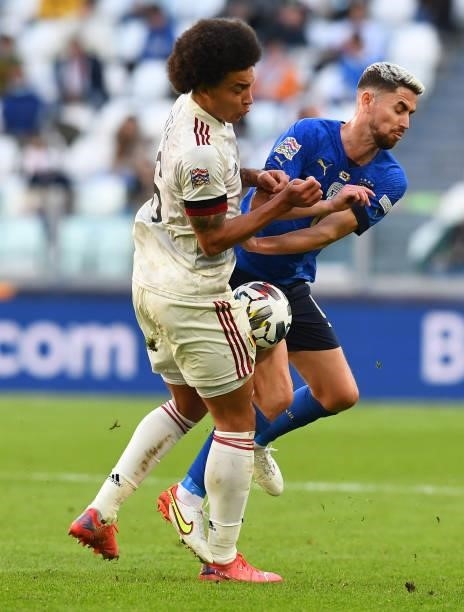 Jorginho of Italy competes for the ball with Axel Witsel of Belgium during the UEFA Nations League 2021 Third Place Match between Italy and Belgium...