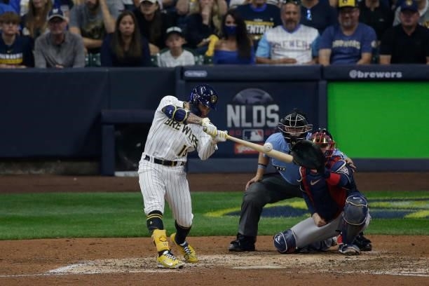 Kolten Wong of the Milwaukee Brewers swings at a pitch during game 2 of the National League Division Series at American Family Field on October 09,...