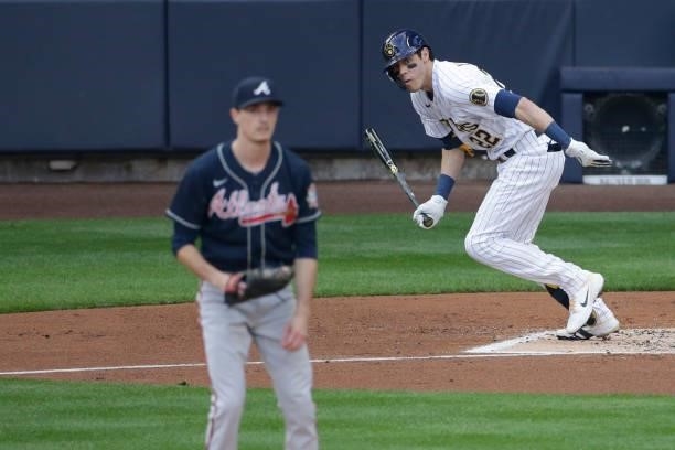 Christian Yelich of the Milwaukee Brewers singles during game 2 of the National League Division Series at American Family Field on October 09, 2021...