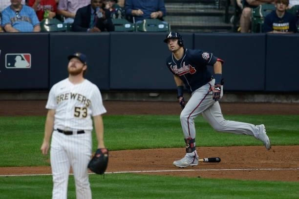 Austin Riley of the Atlanta Braves hits a home run during game 2 of the National League Division Series at American Family Field on October 09, 2021...