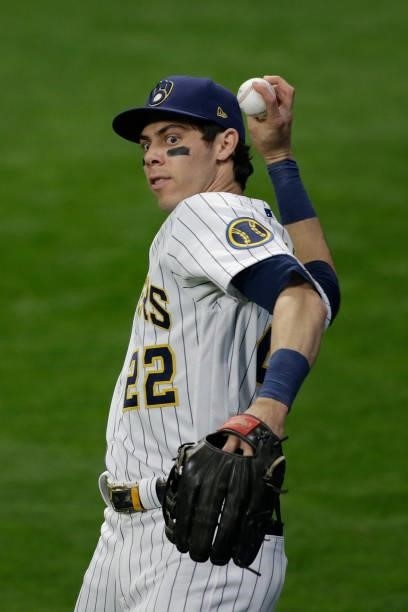 Christian Yelich of the Milwaukee Brewers warms up during game 2 of the National League Division Series at American Family Field on October 09, 2021...