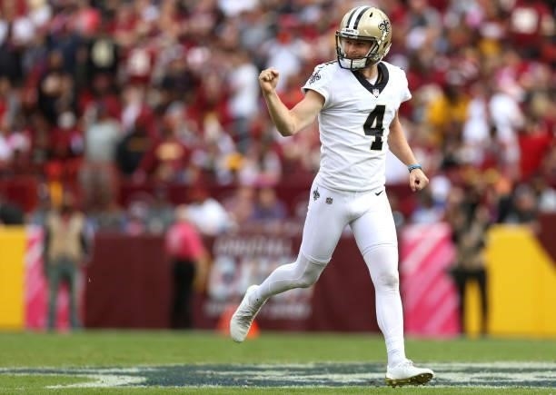 Blake Gillikin of the New Orleans Saints reacts during the second half against the Washington Football Team at FedExField on October 10, 2021 in...