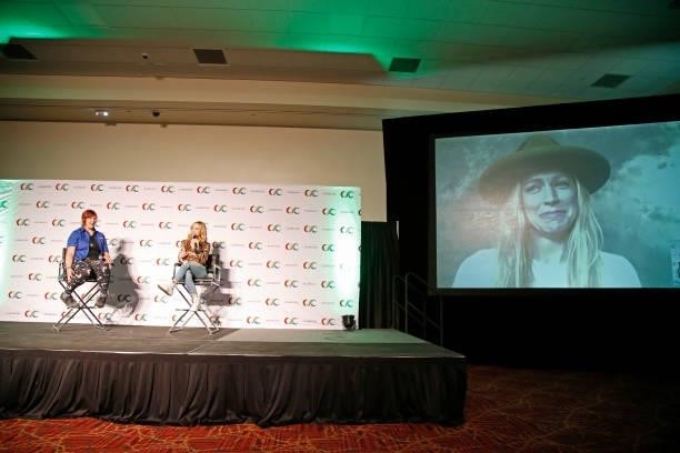 Writer Jessica Mason and Caity Lotz speak with Jes Macallan, who is displayed on a screen via videoconferencing software during the "Caity Lotz & Jes...