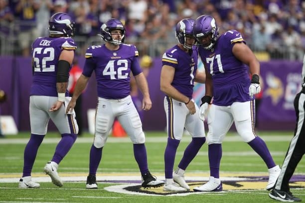 Greg Joseph of the Minnesota Vikings celebrates with teammates after kicking a field goal during the fourth quarter against the Detroit Lions at U.S....