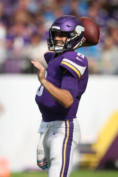 Kirk Cousins of the Minnesota Vikings throws the ball during the fourth quarter against the Detroit Lions at U.S. Bank Stadium on October 10, 2021 in...