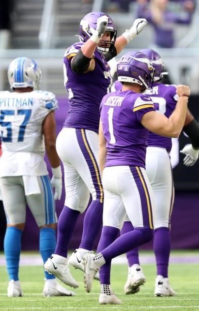 Greg Joseph of the Minnesota Vikings celebrates with teammates after kicking a game winning field goal during the fourth quarter against the Detroit...