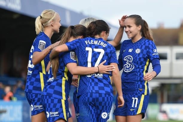 Fran Kirby of Chelsea celebrates with teammates after scoring her team's second goal during the Barclays FA Women's Super League match between...