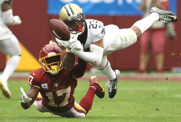 Marshon Lattimore of the New Orleans Saints breaks up a pass intended for Terry McLaurin of the Washington Football Team during the second half at...