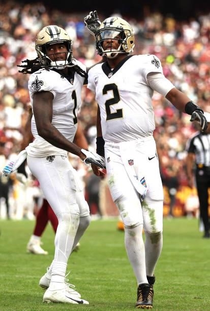 Jameis Winston of the New Orleans Saints and Marquez Callaway a touchdown during the second half against the Washington Football Team at FedExField...