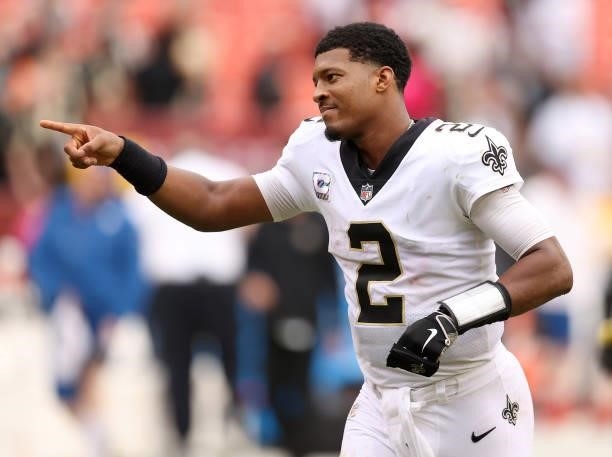 Jameis Winston of the New Orleans Saints celebrates after a game against the Washington Football Team at FedExField on October 10, 2021 in Landover,...