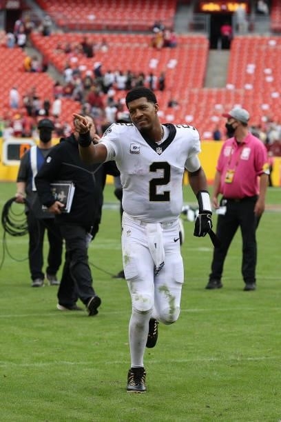 Jameis Winston of the New Orleans Saints celebrates after a game against the Washington Football Team at FedExField on October 10, 2021 in Landover,...