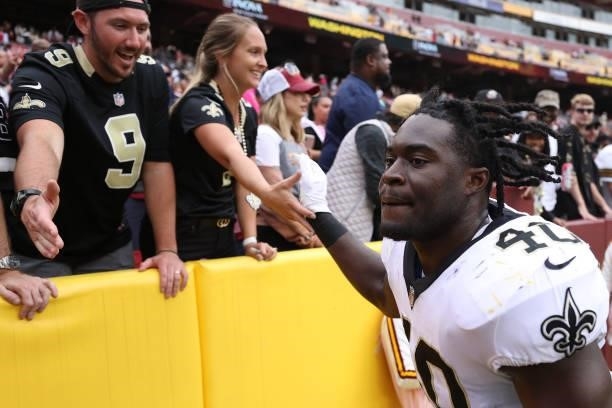 Alex Armah of the New Orleans Saints celebrates after a game against the Washington Football Team at FedExField on October 10, 2021 in Landover,...