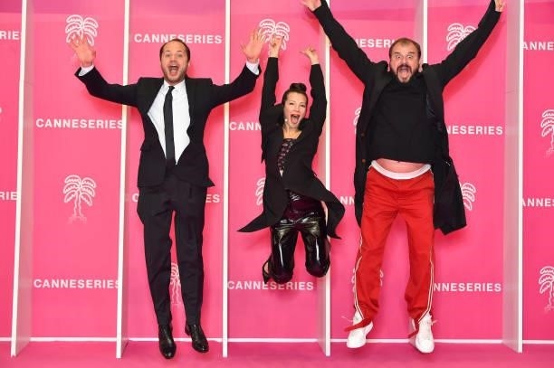 Evgeny Nikishov, Alina Gvasalia and Valeriy Fedorovich attend the 4th Canneseries Festival - Day Three on October 10, 2021 in Cannes, France.