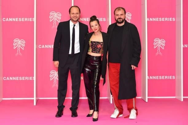 Evgeny Nikishov, Alina Gvasalia and Valeriy Fedorovich attend the 4th Canneseries Festival - Day Three on October 10, 2021 in Cannes, France.