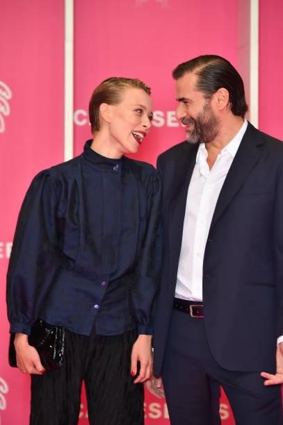 Ivanna Sakhno and Gregory Fitoussi attend the 4th Canneseries Festival - Day Three on October 10, 2021 in Cannes, France.