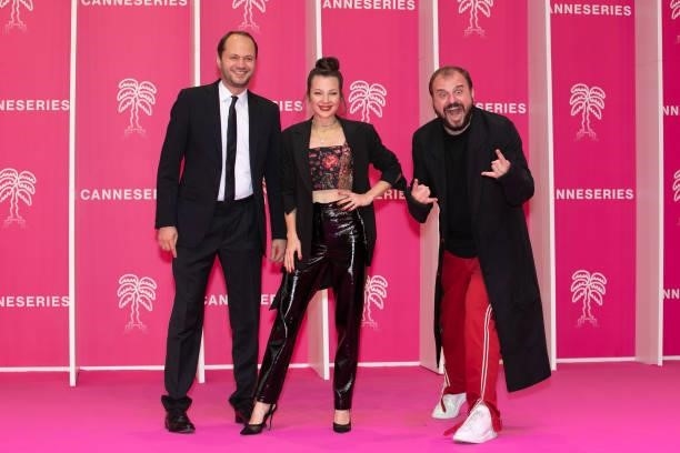 Evdeniy Nikishov, Alina Gvasaliia and Valeriy Fedorevich attend the 4th Canneseries Festival - Day Three on October 10, 2021 in Cannes, France.