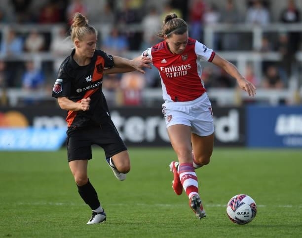 Katie McCabe of Arsenal takes on Leonie Maier of Everton during the Barclays FA Women's Super League match between Arsenal Women and Everton Women at...