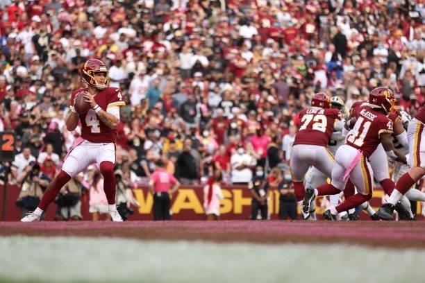 Taylor Heinicke of the Washington Football Team throws the ball during the second half against the New Orleans Saints at FedExField on October 10,...