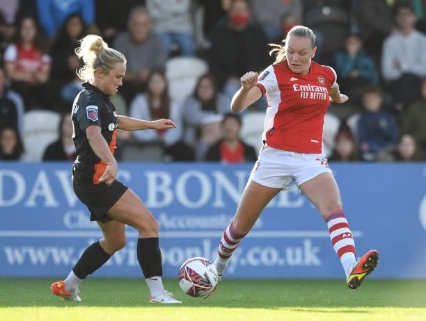 Frida Maanum of Arsenal takes on Izzy Christiensen of Everton during the Barclays FA Women's Super League match between Arsenal Women and Everton...