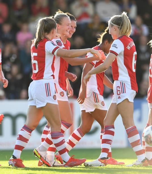 Frida Maanum celebrates scoring Arsenal's 3rd goal Leah Williamson and Katie McCabe during the Barclays FA Women's Super League match between Arsenal...